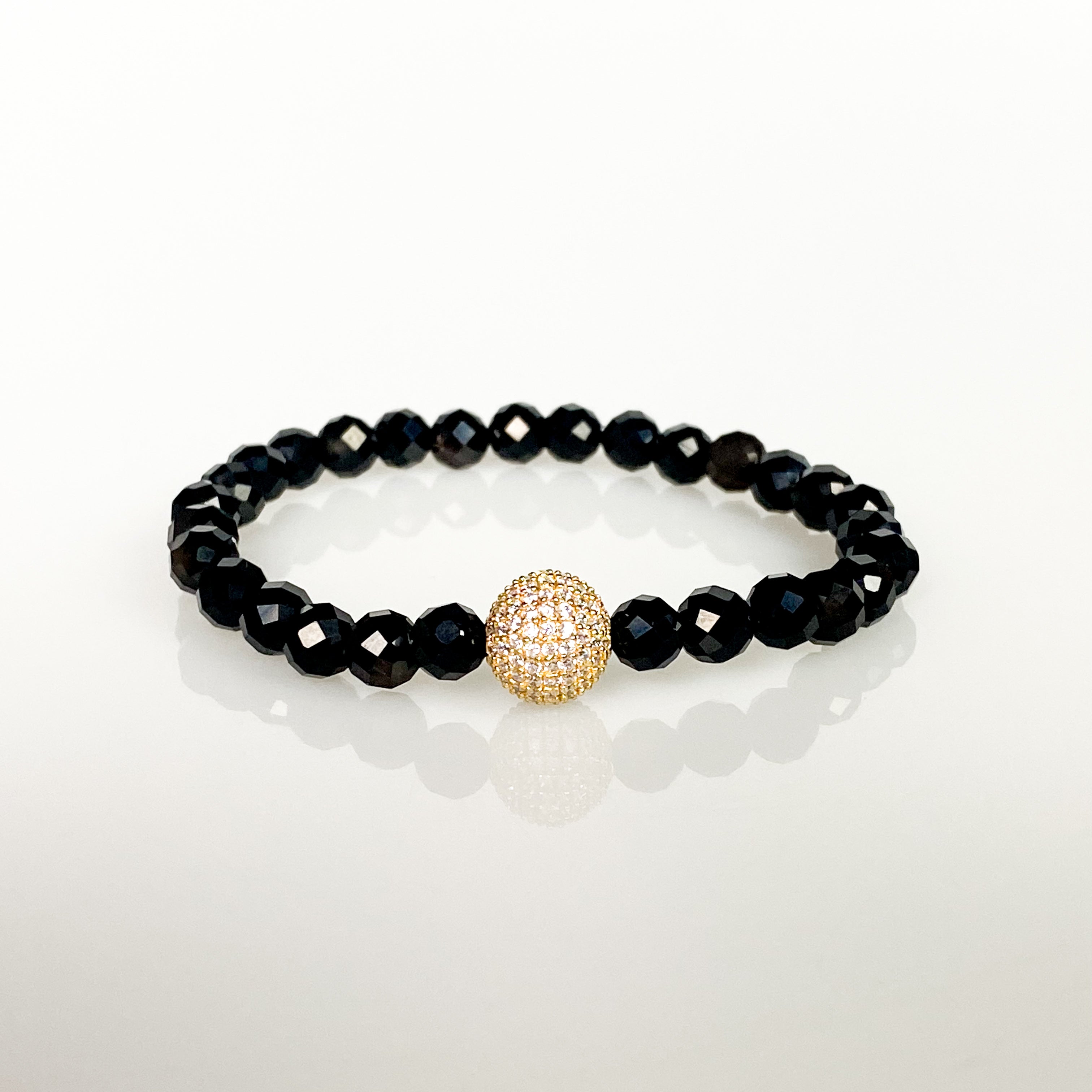 CRYSTAL BALL ON BLACK ONYX ELASTIC BRACELET