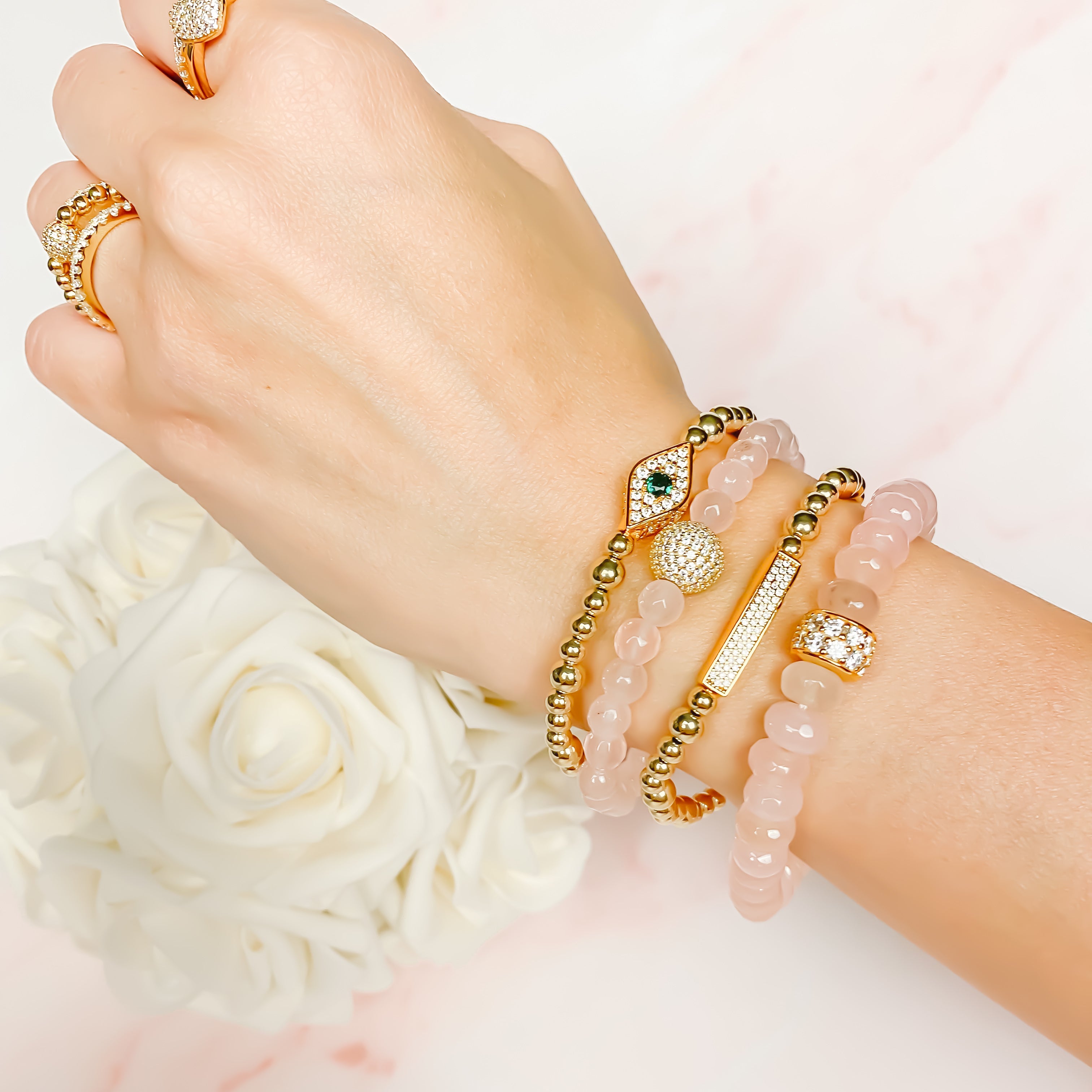 CRYSTAL BALL ON ROSE JADE ELASTIC BRACELET