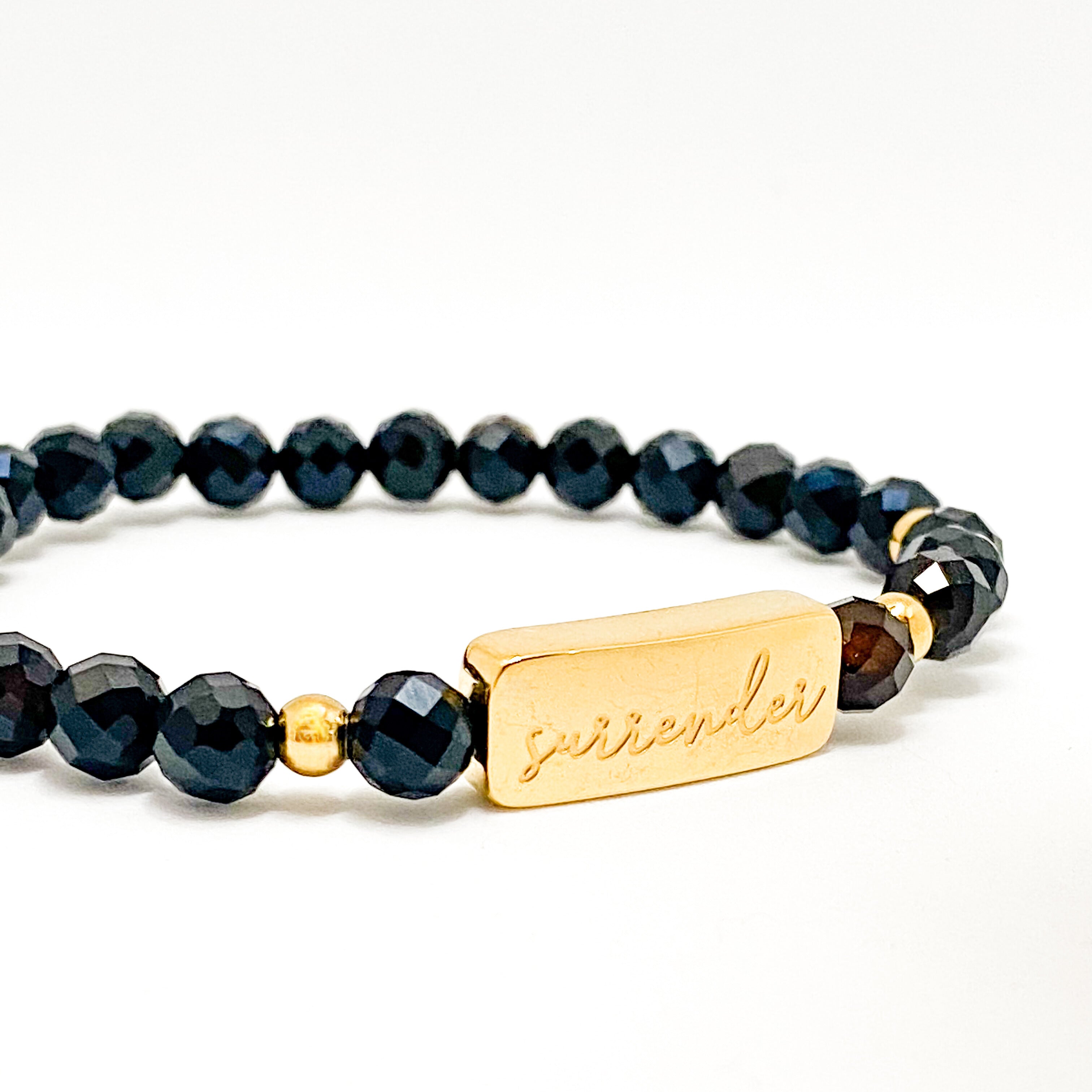 SURRENDER ON BLACK ONYX ELASTIC BRACELET