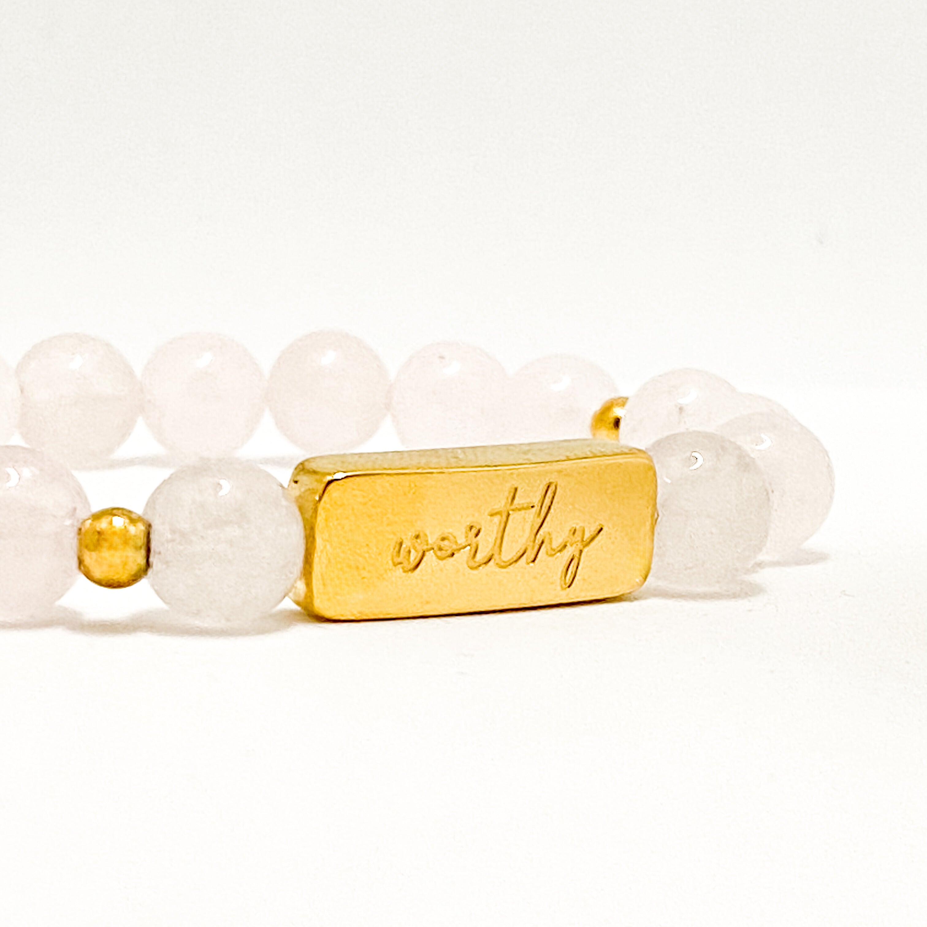 WORTHY ON ROSE QUARTZ ELASTIC BRACELET