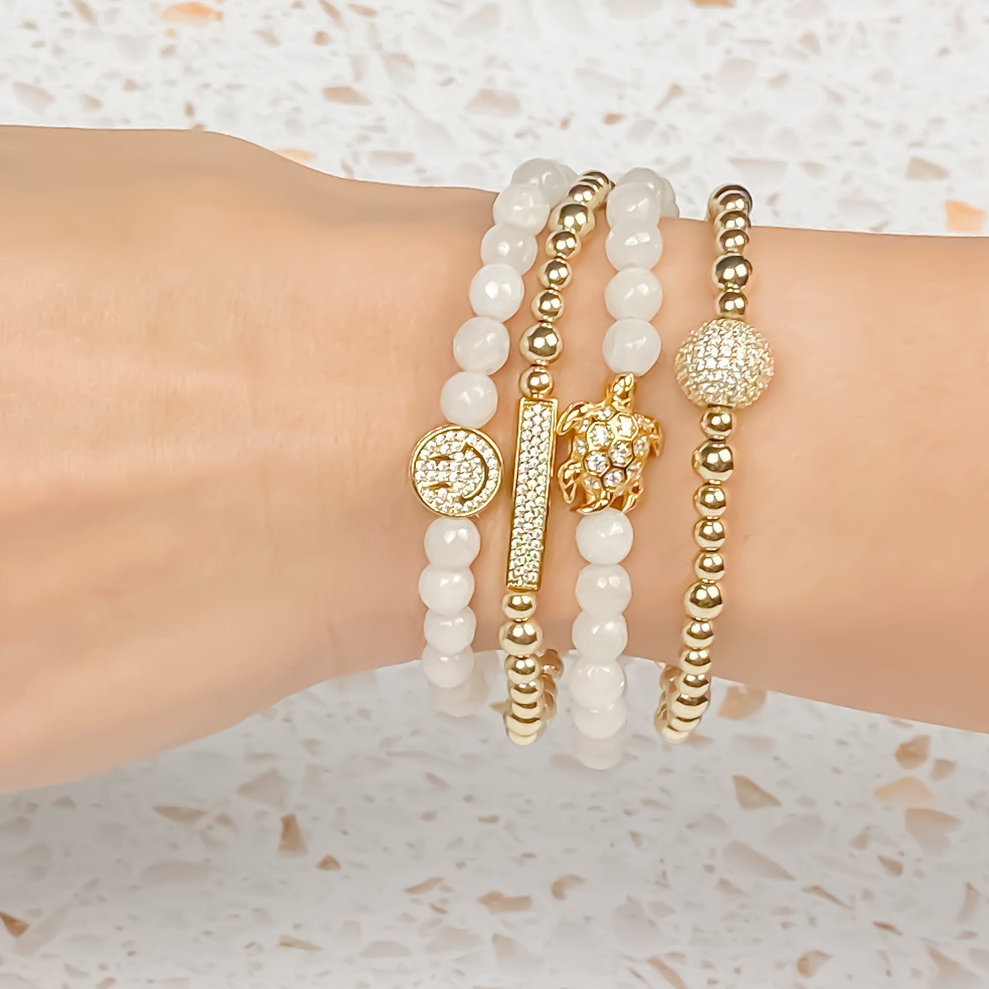 SMILEY FACE ON WHITE JADE ELASTIC BRACELET