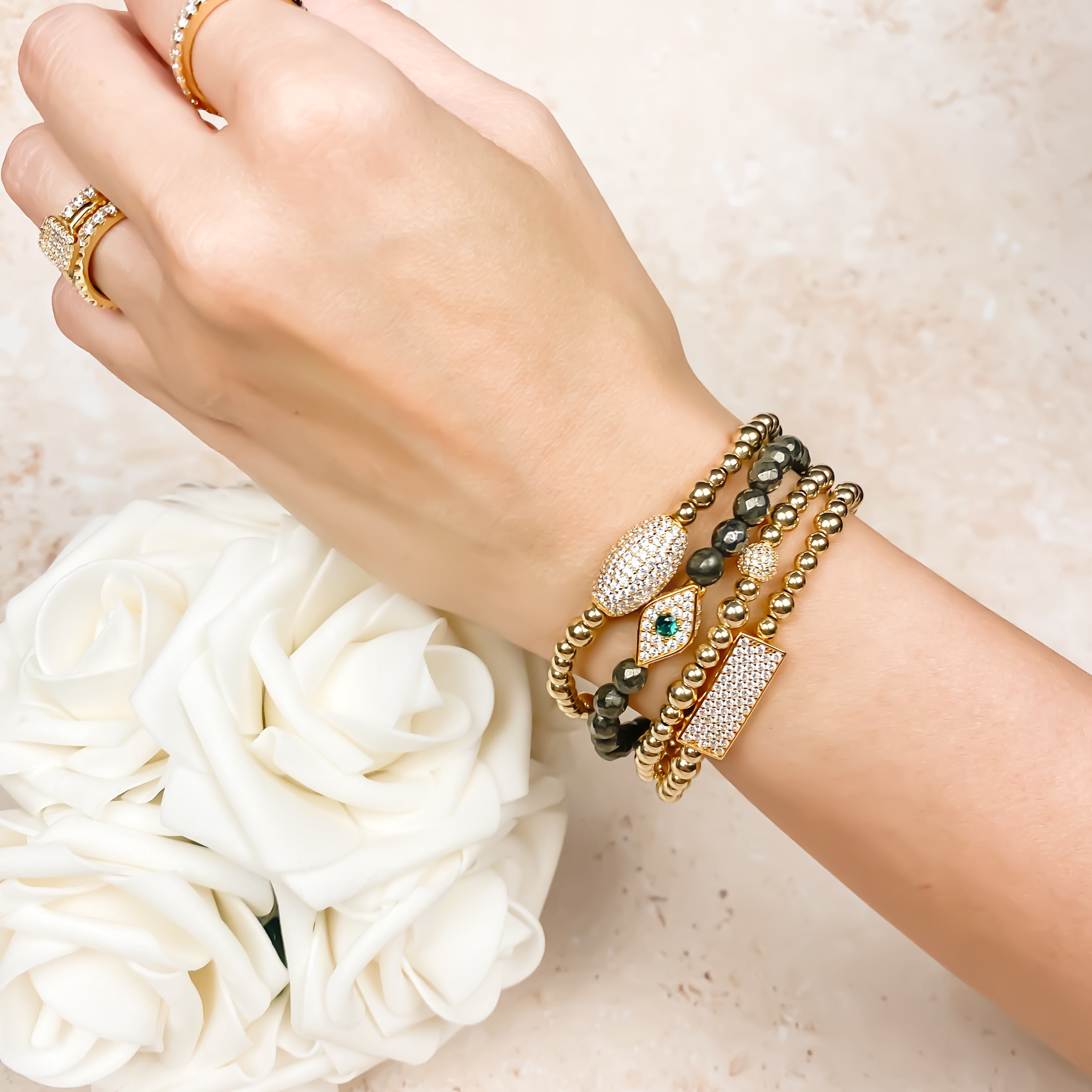 EVIL EYE ON PYRITE ELASTIC BRACELET