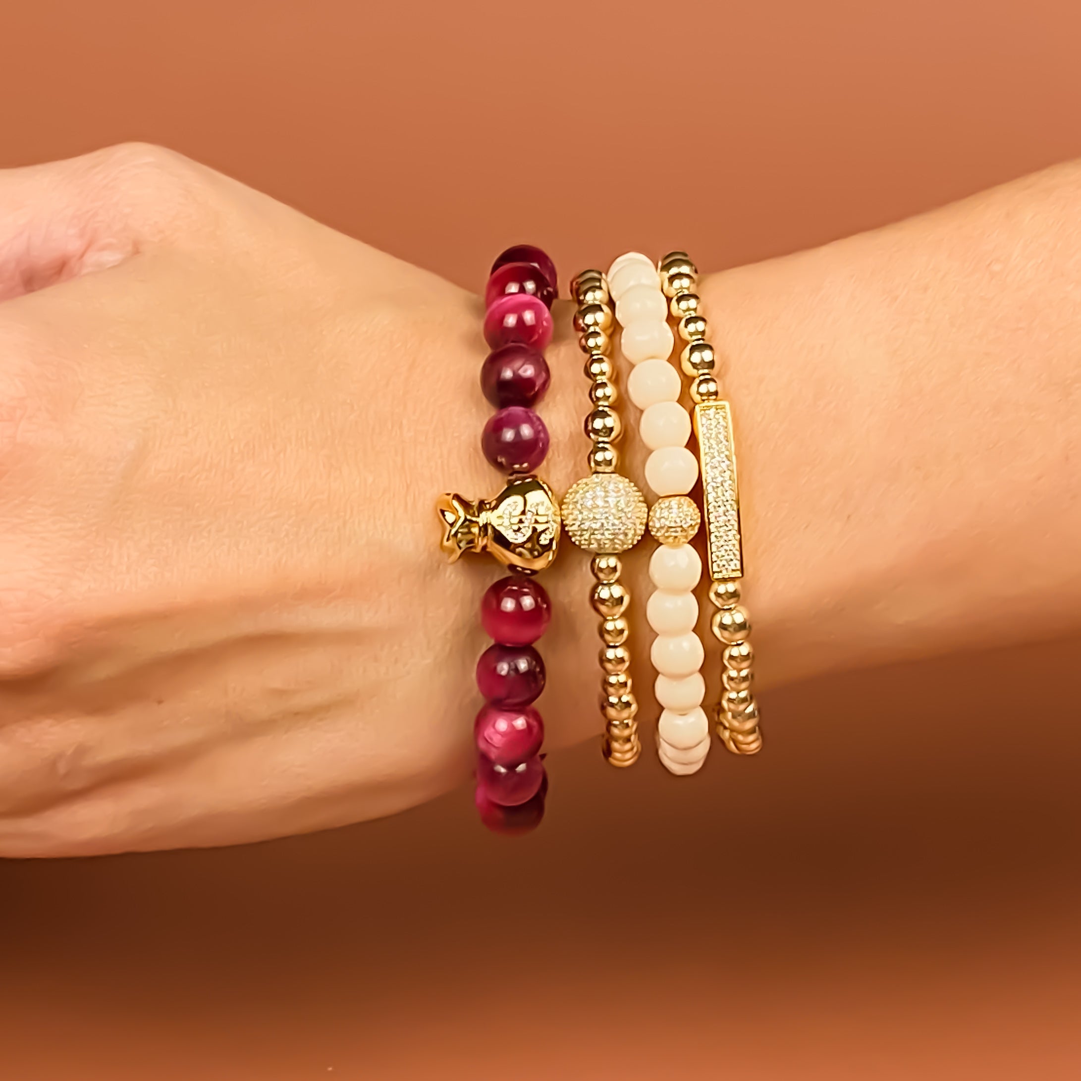 MONEY BAG ON MAGENTA TIGER EYE ELASTIC BRACELET