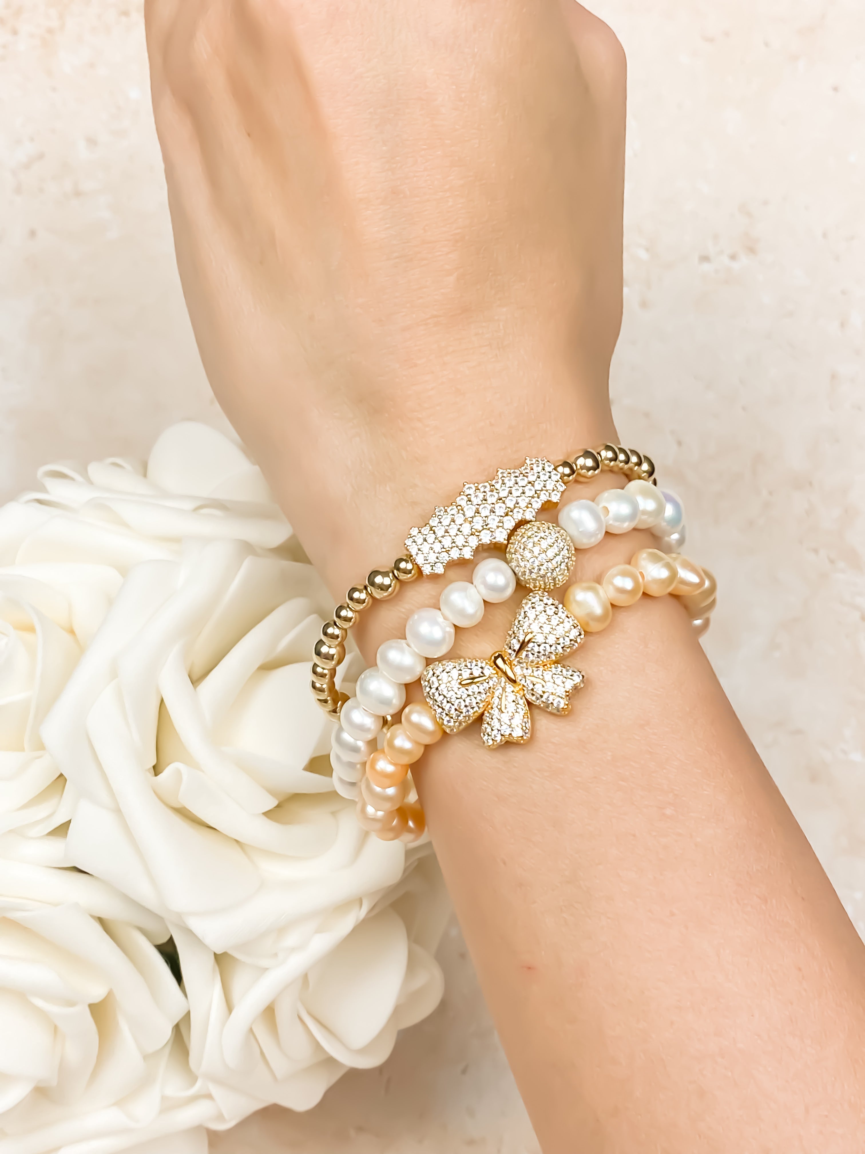 RIBBON ON PEACH PEARL ELASTIC BRACELET