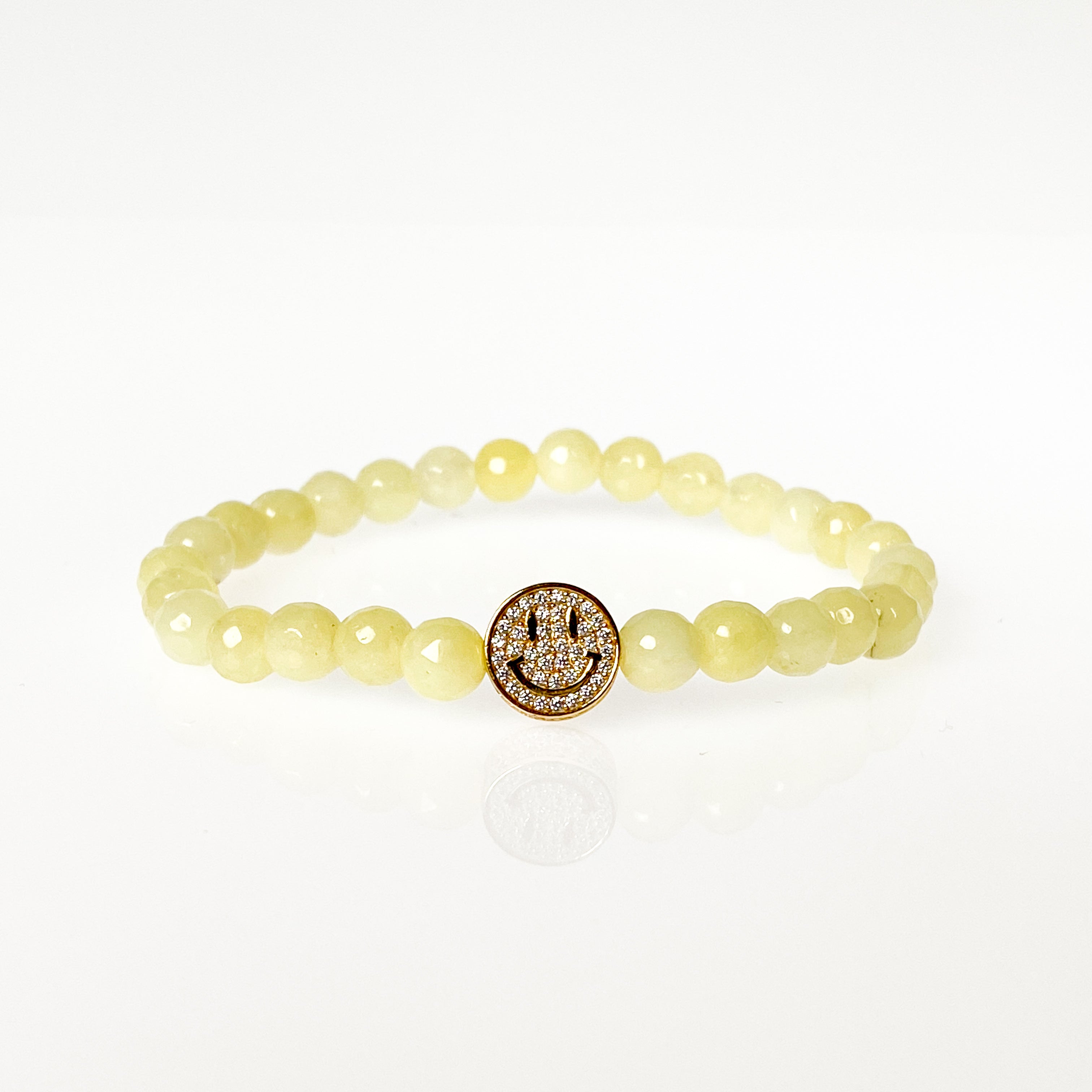 SMILEY FACE ON YELLOW CREAM ELASTIC BRACELET