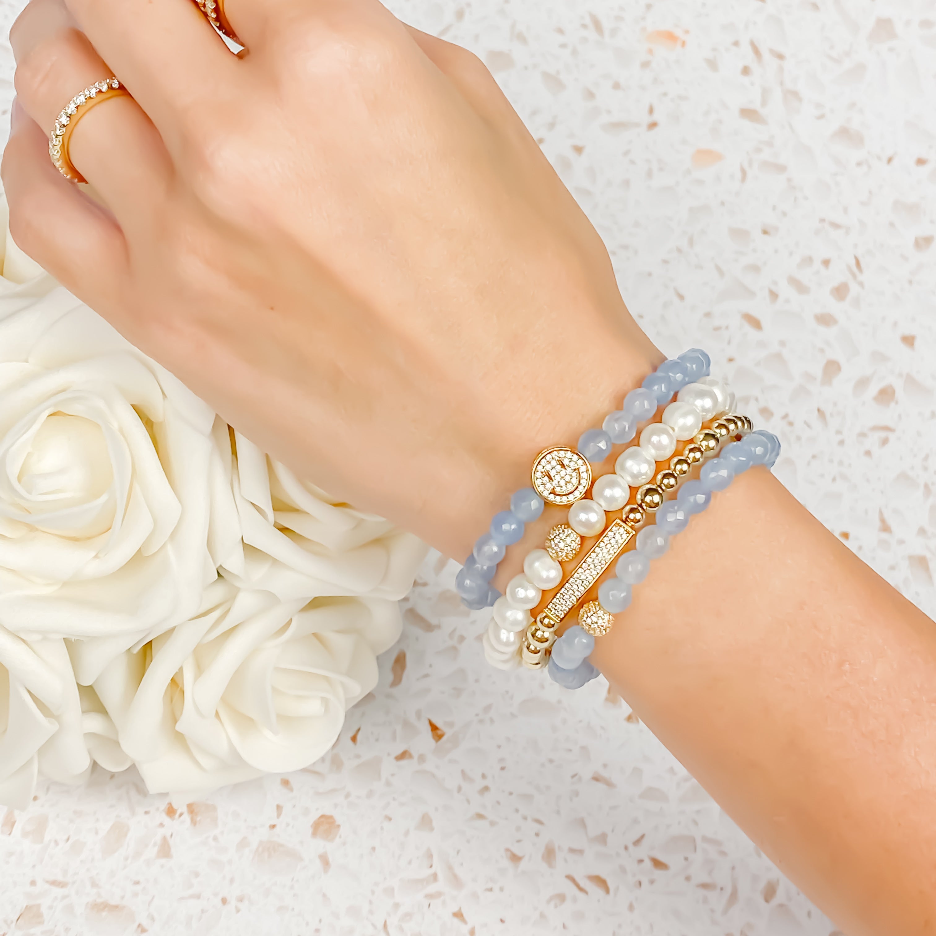 SMILEY FACE ON COOL WATER ELASTIC BRACELET