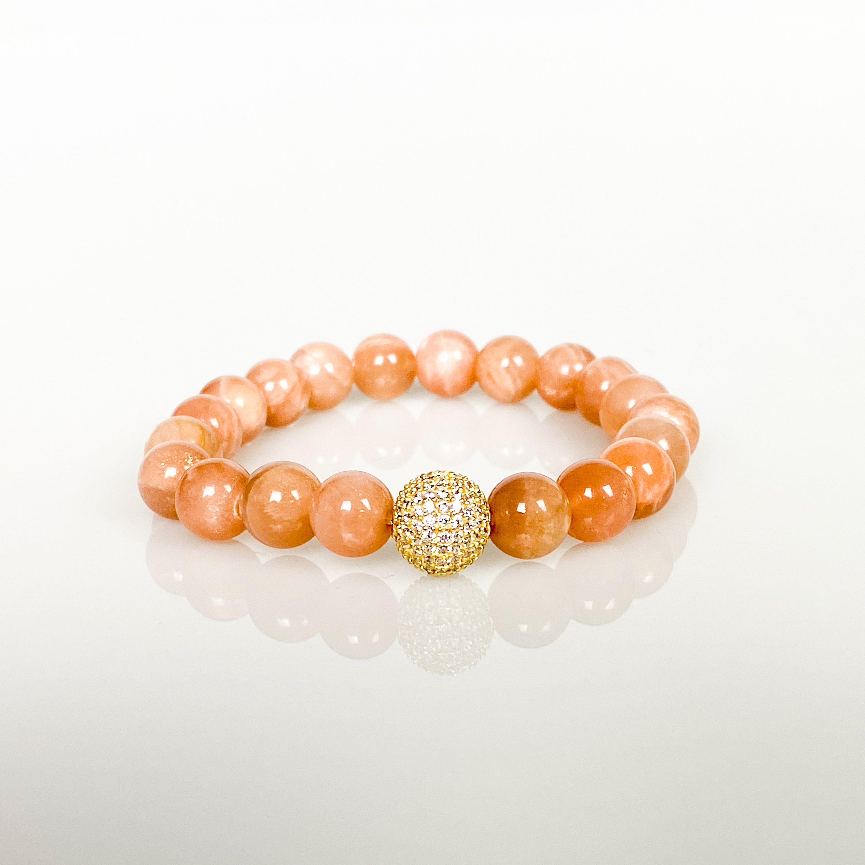 CRSYTAL BALL ON SUNSTONE ELASTIC BRACELET