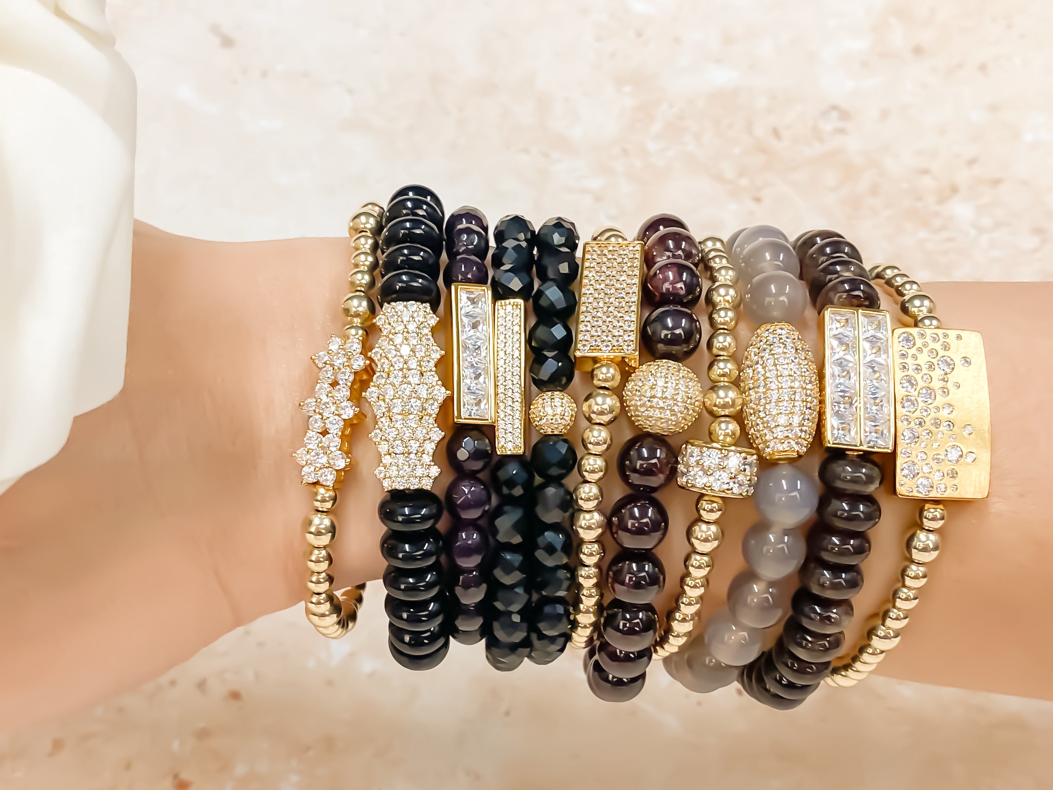 MINI CRYSTAL BAR ON BLACK ONYX ELASTIC BRACELET