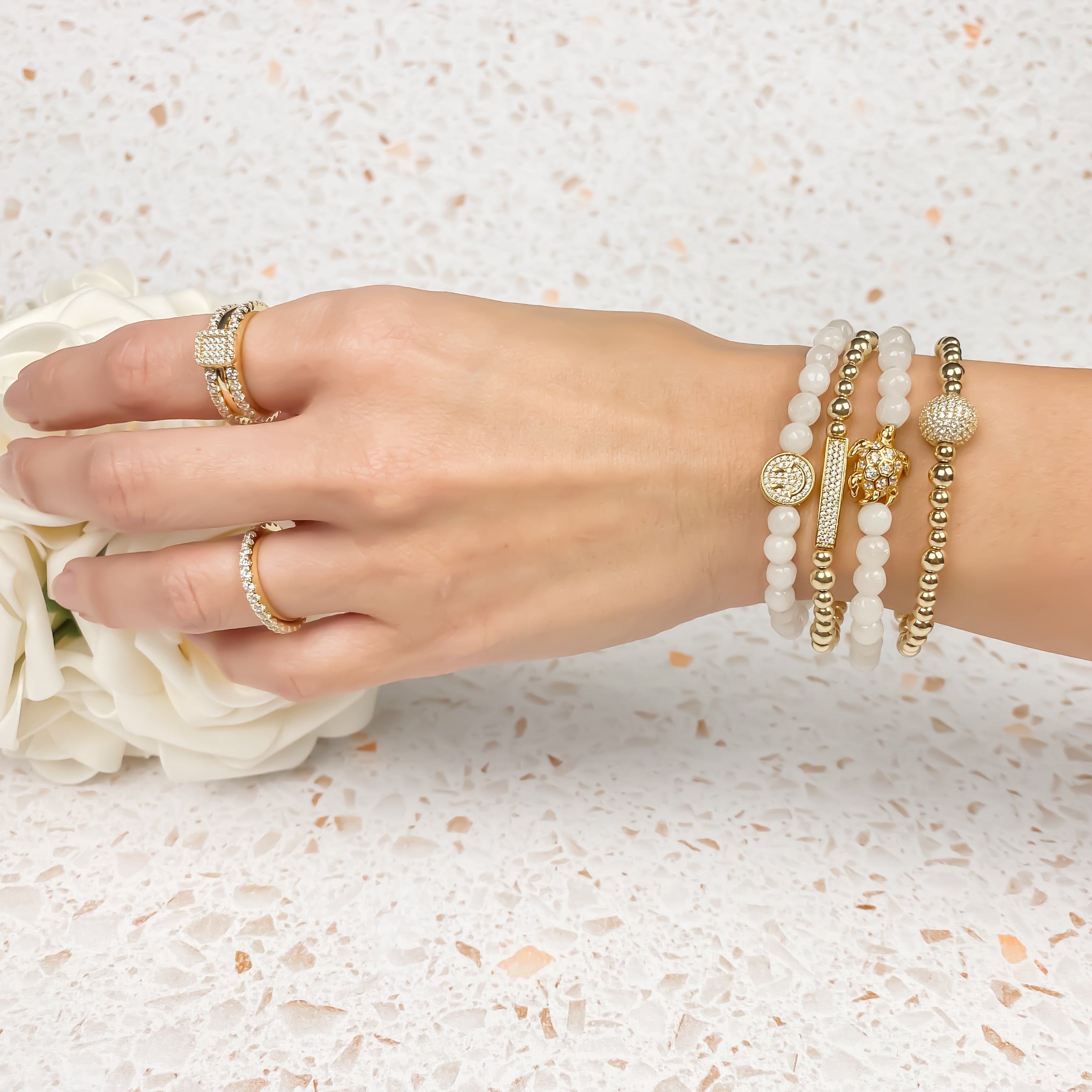 SMILEY FACE ON WHITE JADE ELASTIC BRACELET