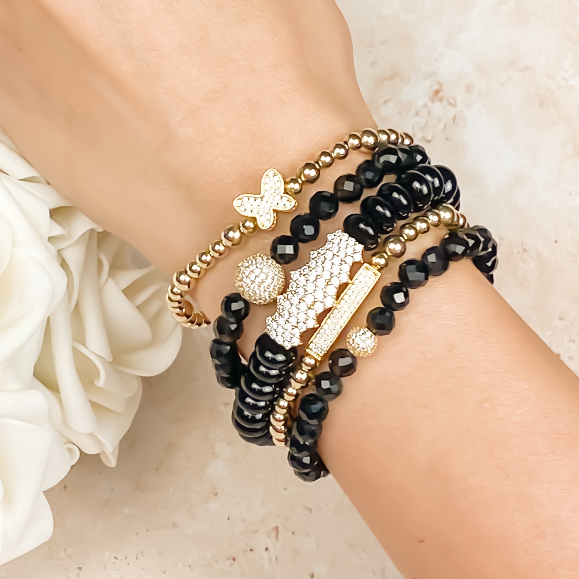 CRYSTAL BALL ON BLACK ONYX ELASTIC BRACELET