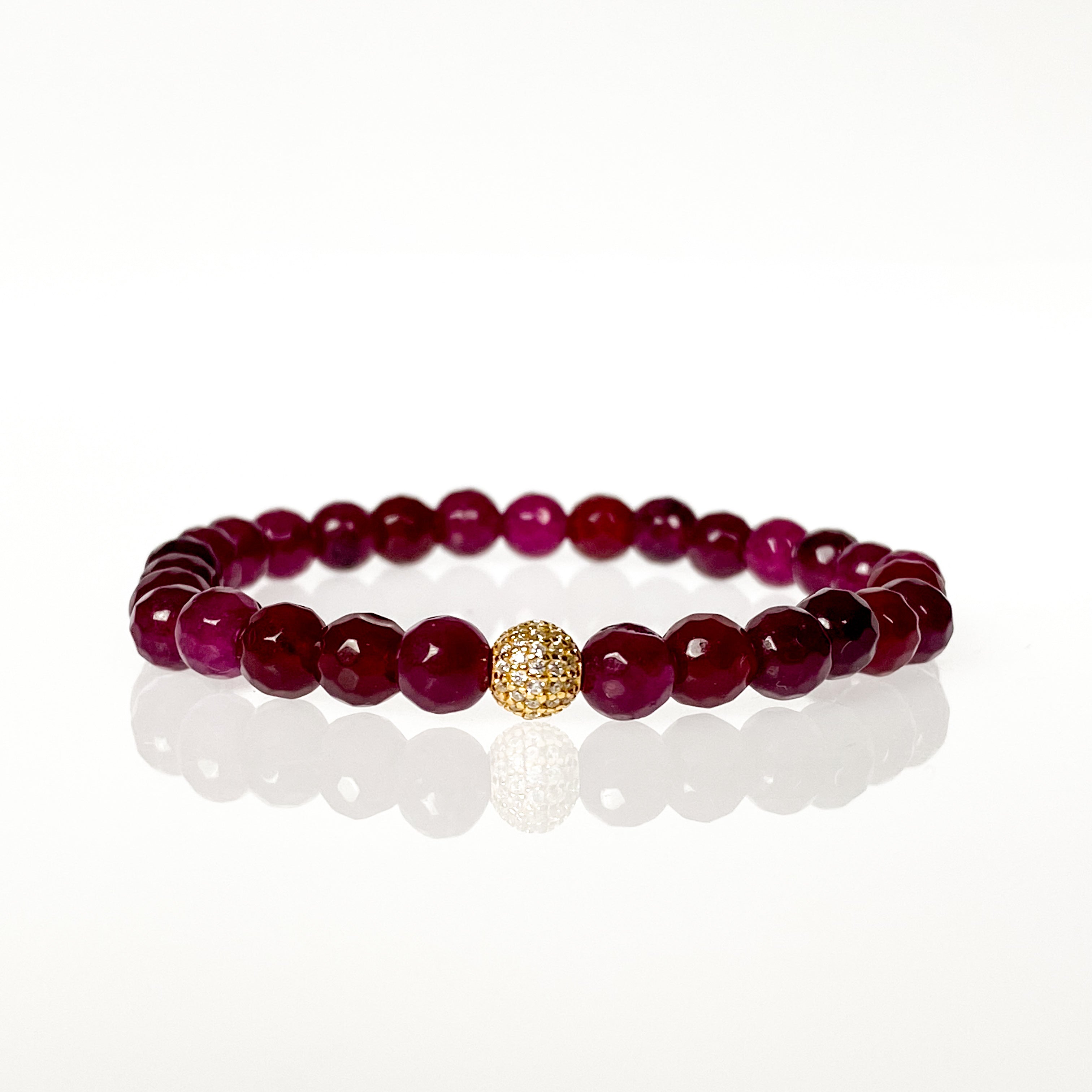 MINI CRYSTAL BALL ON POMEGRANATE ELASTIC BRACELET