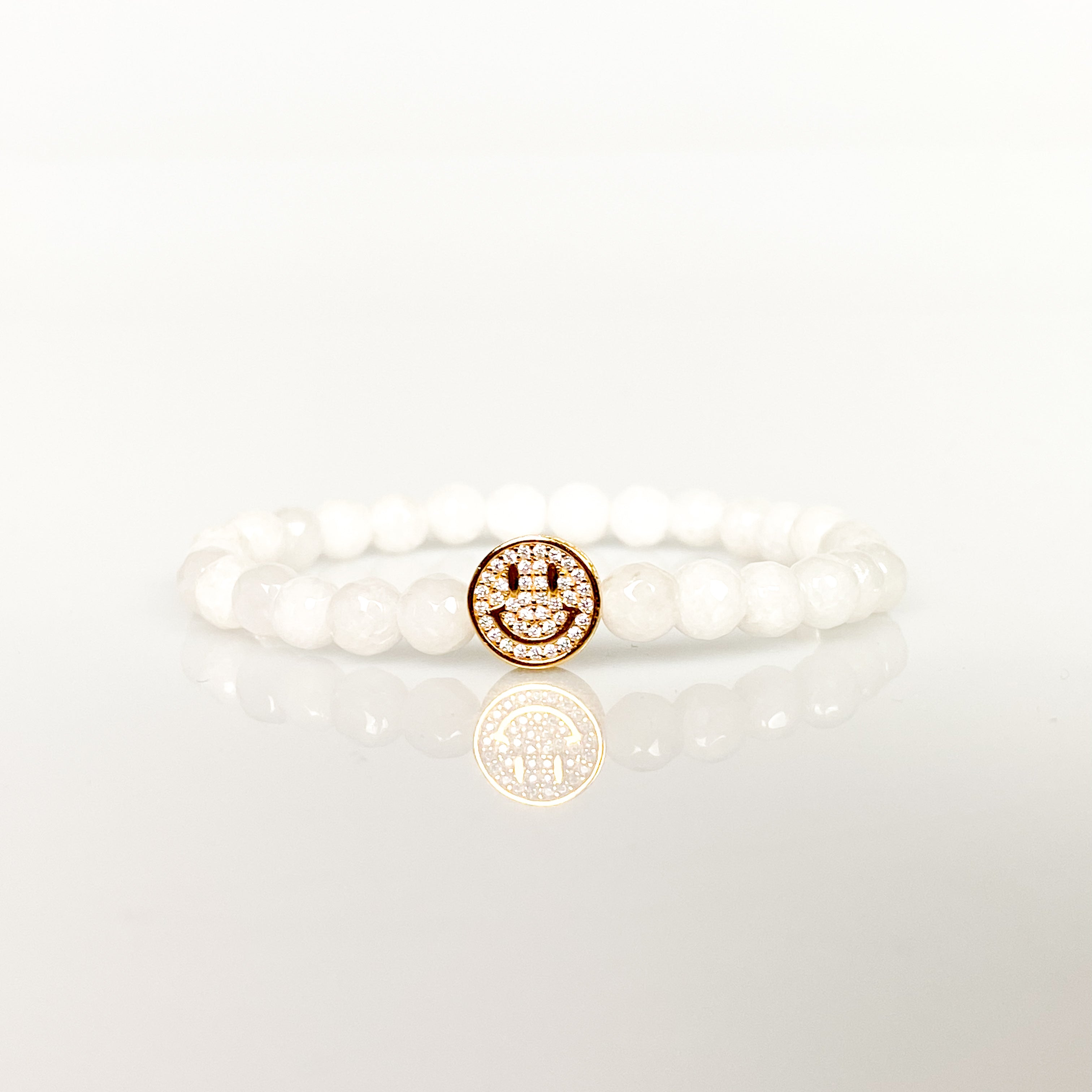SMILEY FACE ON WHITE JADE ELASTIC BRACELET