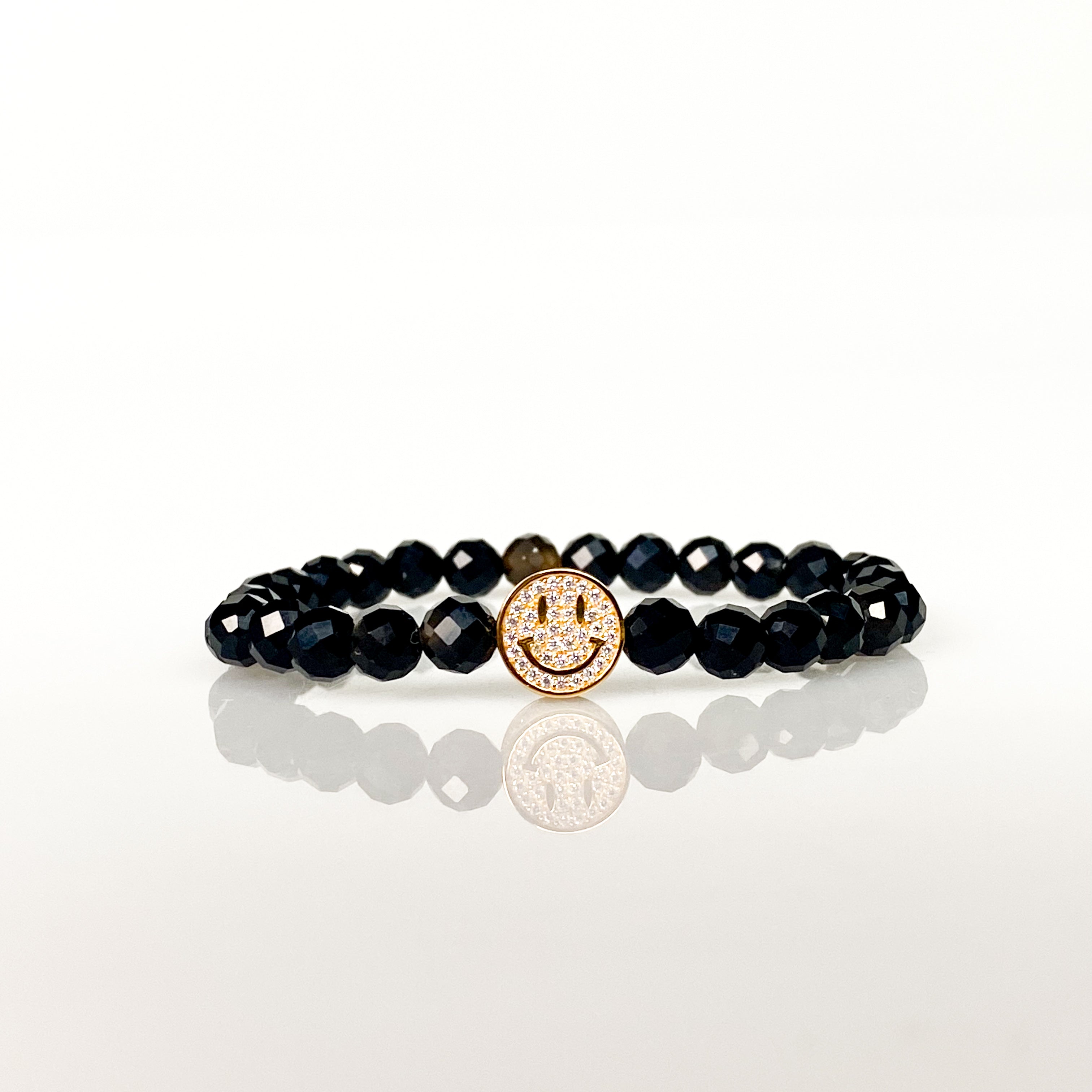 SMILEY FACE ON BLACK ONYX ELASTIC BRACELET