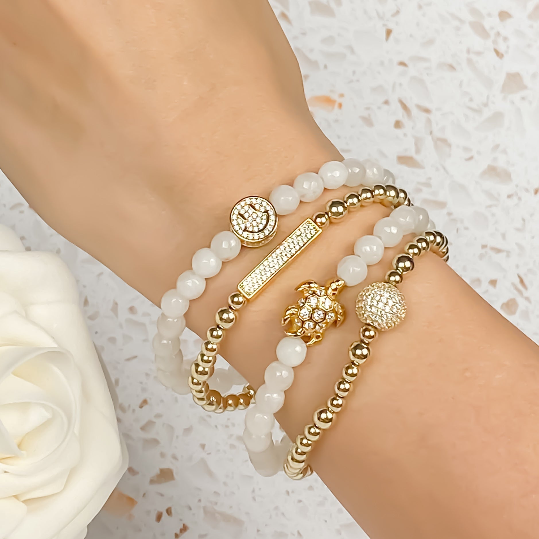 SMILEY FACE ON WHITE JADE ELASTIC BRACELET