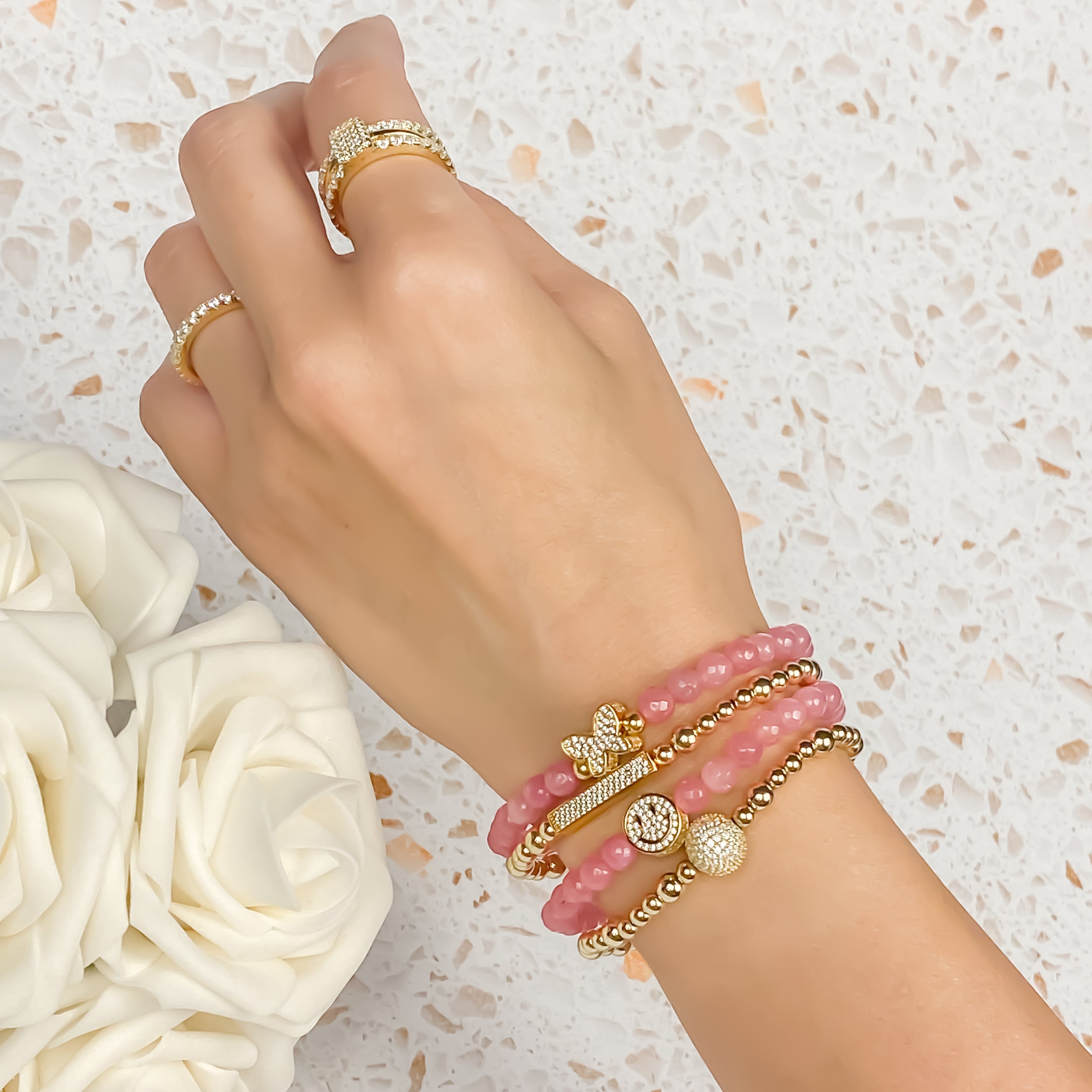 SMILEY FACE ON PINK LEMONADE ELASTIC BRACELET