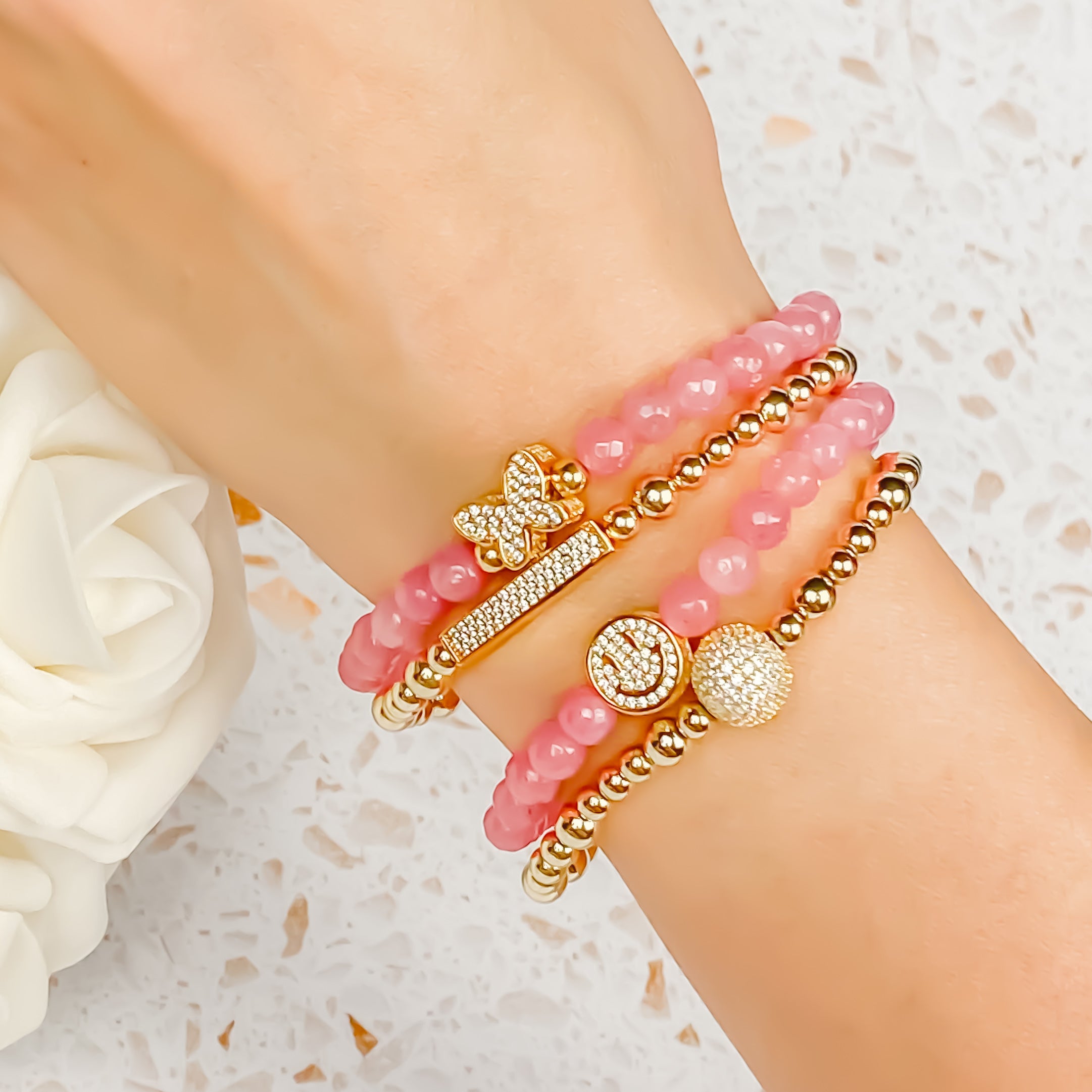 SMILEY FACE ON PINK LEMONADE ELASTIC BRACELET