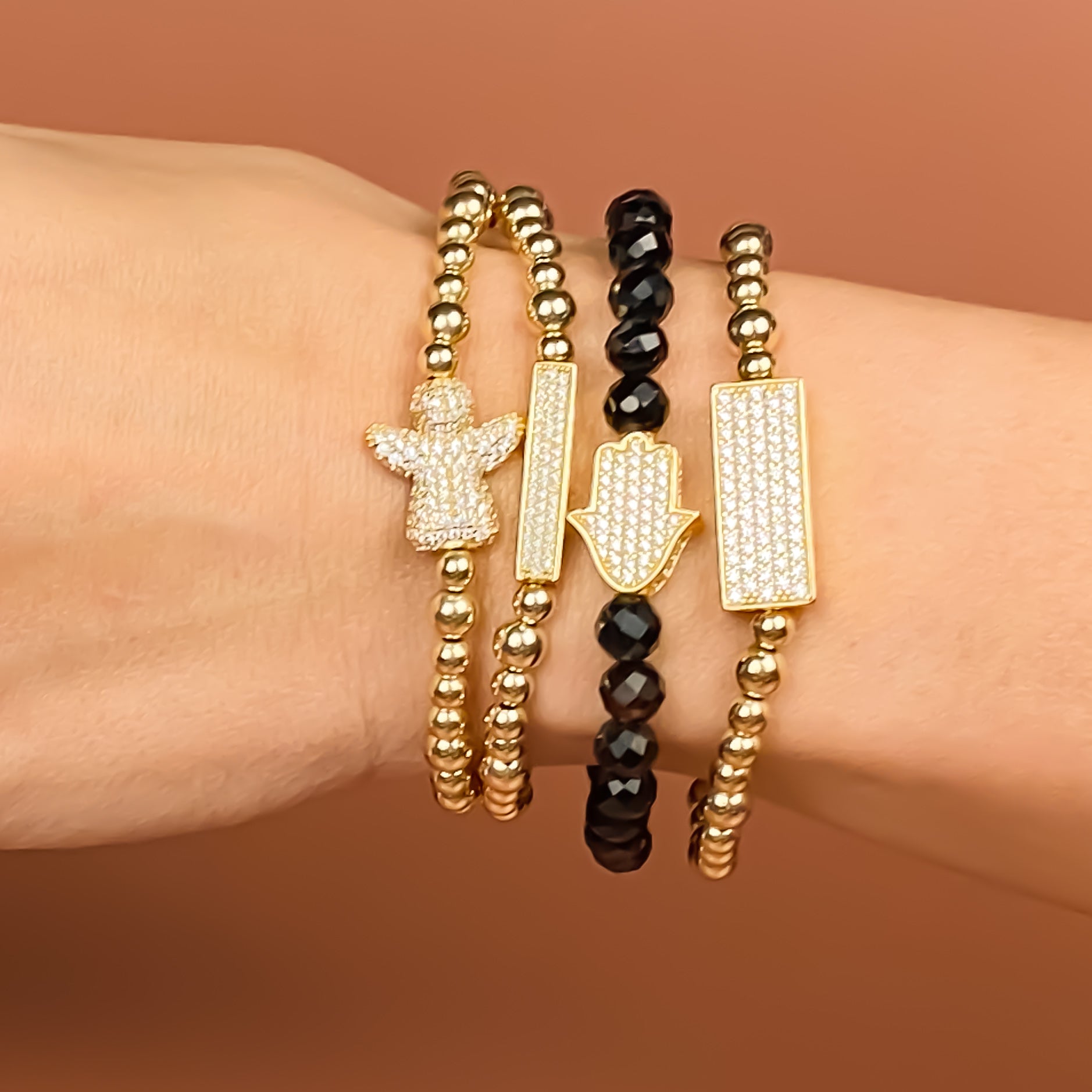 HAMSA ON BLACK ONYX ELASTIC BRACELET