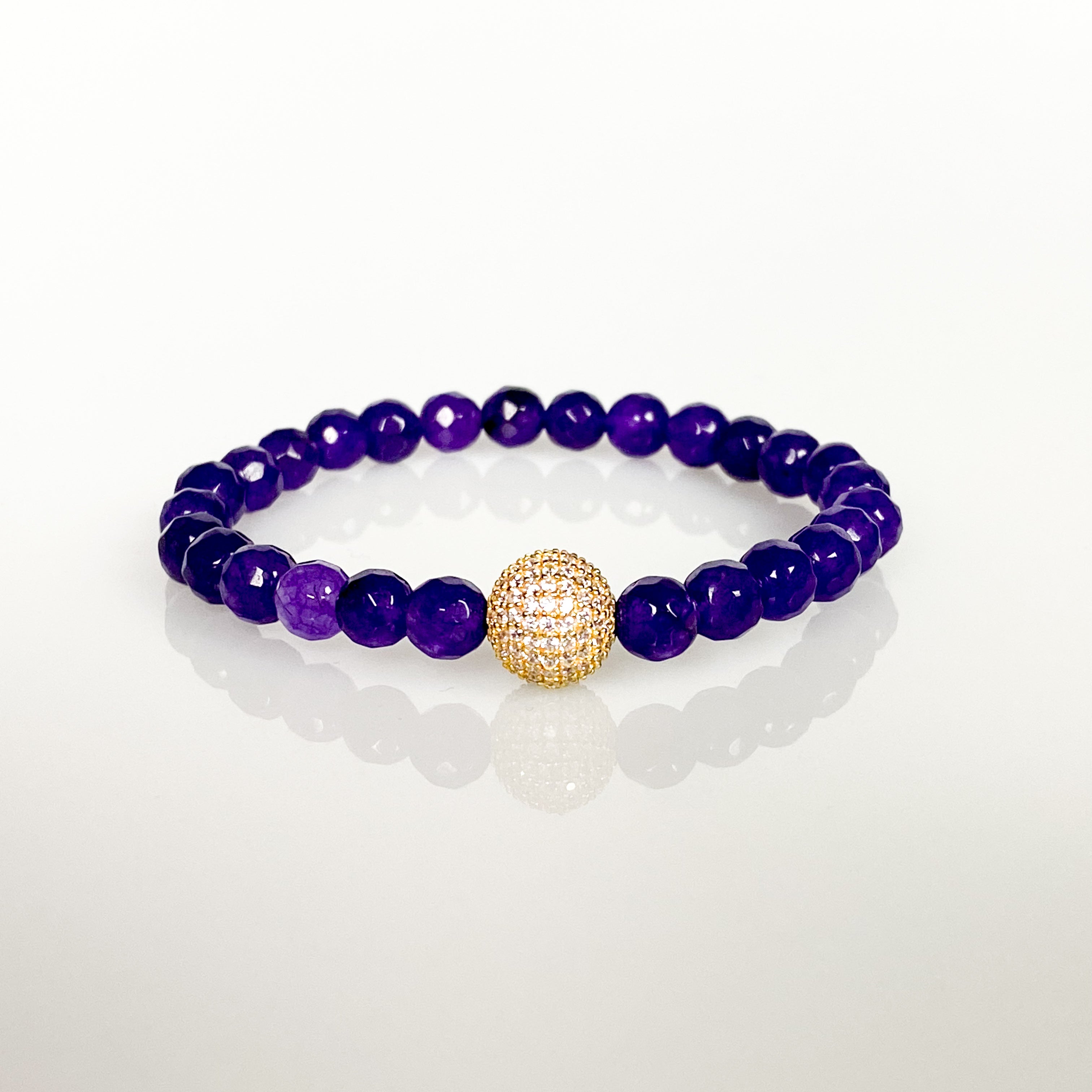 CRYSTAL BALL ON PURPLE YAM ELASTIC BRACELET