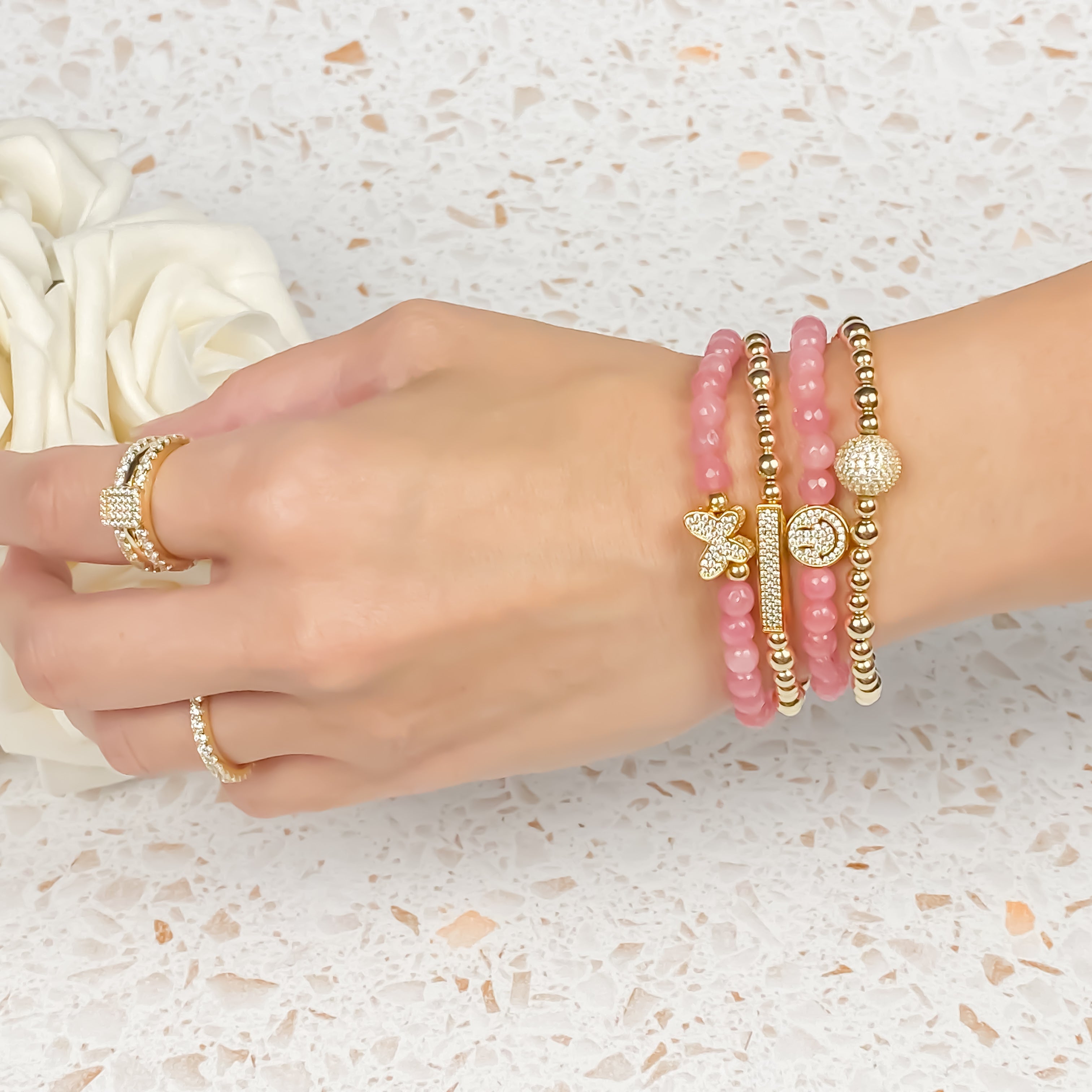 SMILEY FACE ON PINK LEMONADE ELASTIC BRACELET