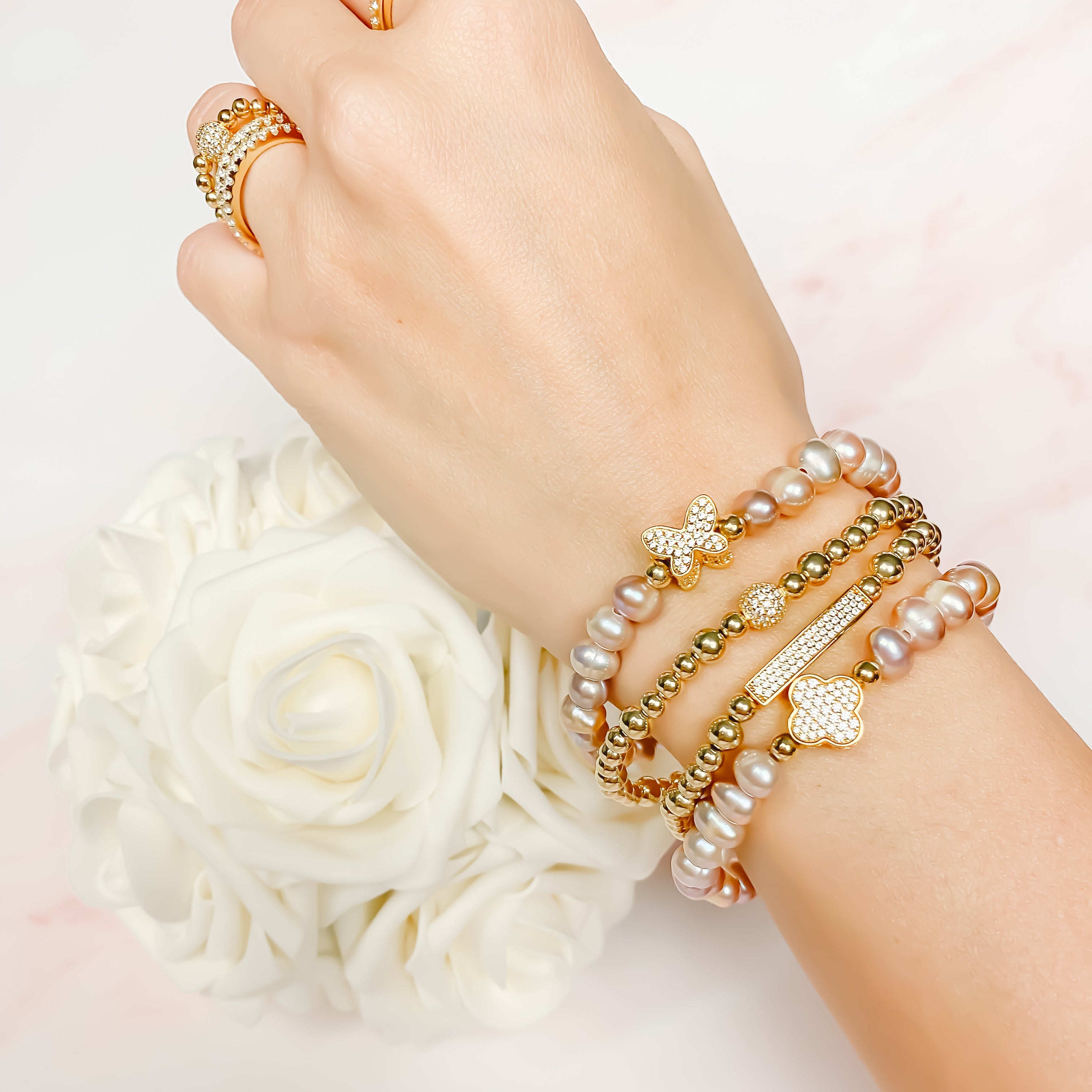 CLOVER ON PURPLE PEARL ELASTIC BRACELET