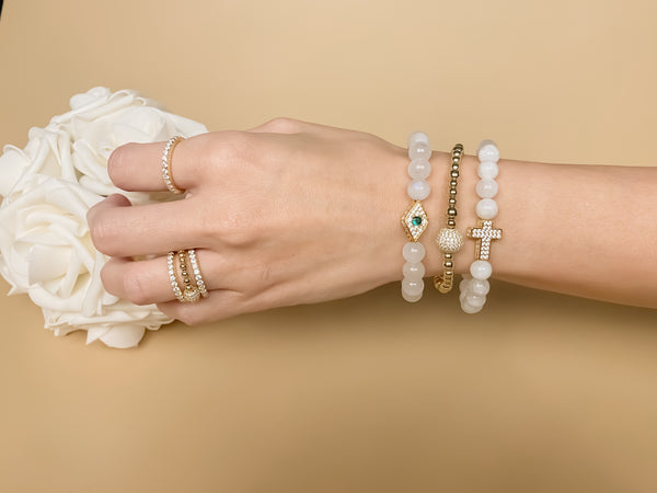 CROSS ON WHITE MOONSTONE ELASTIC BRACELET
