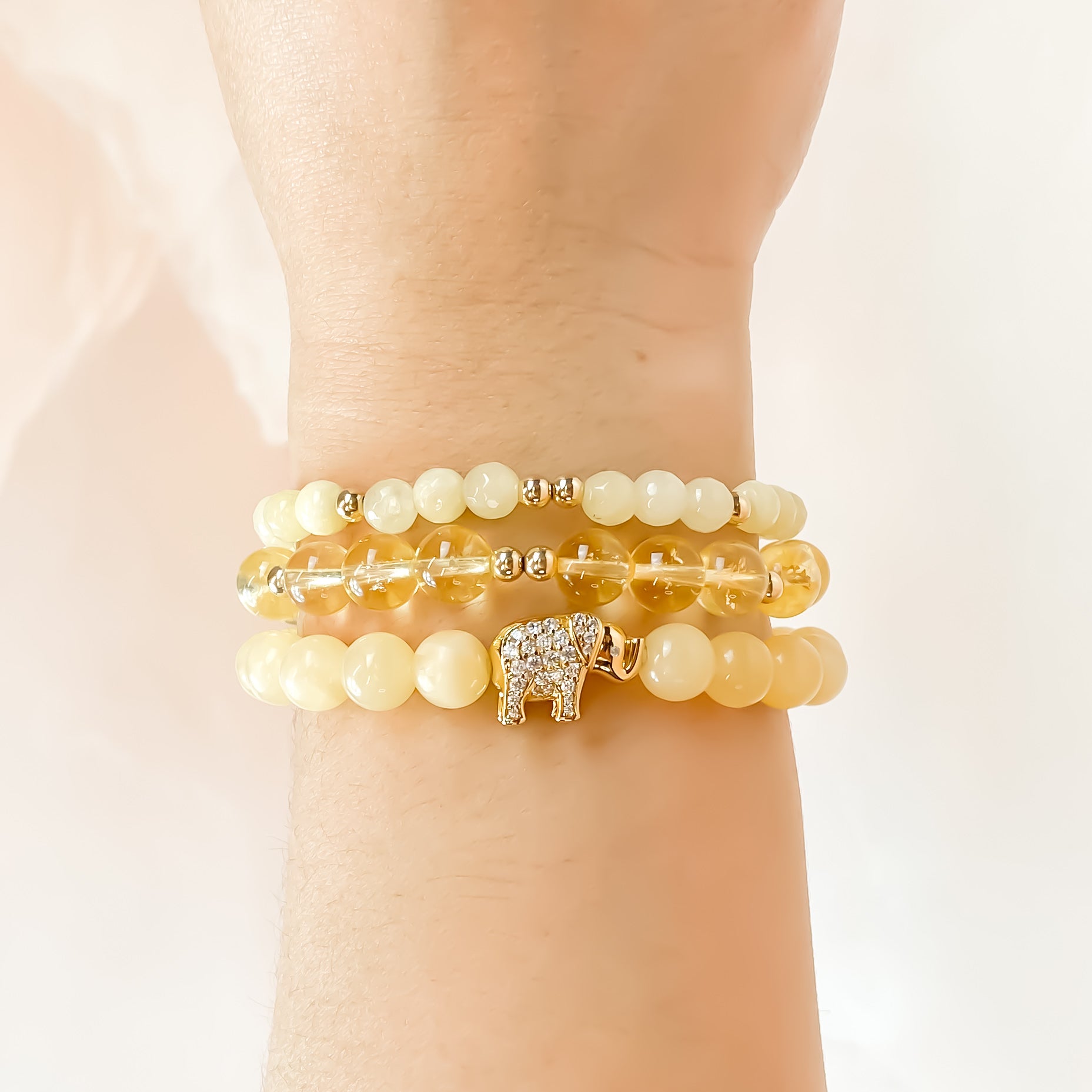 ELEPHANT ON HONEY ONYX ELASTIC BRACELET