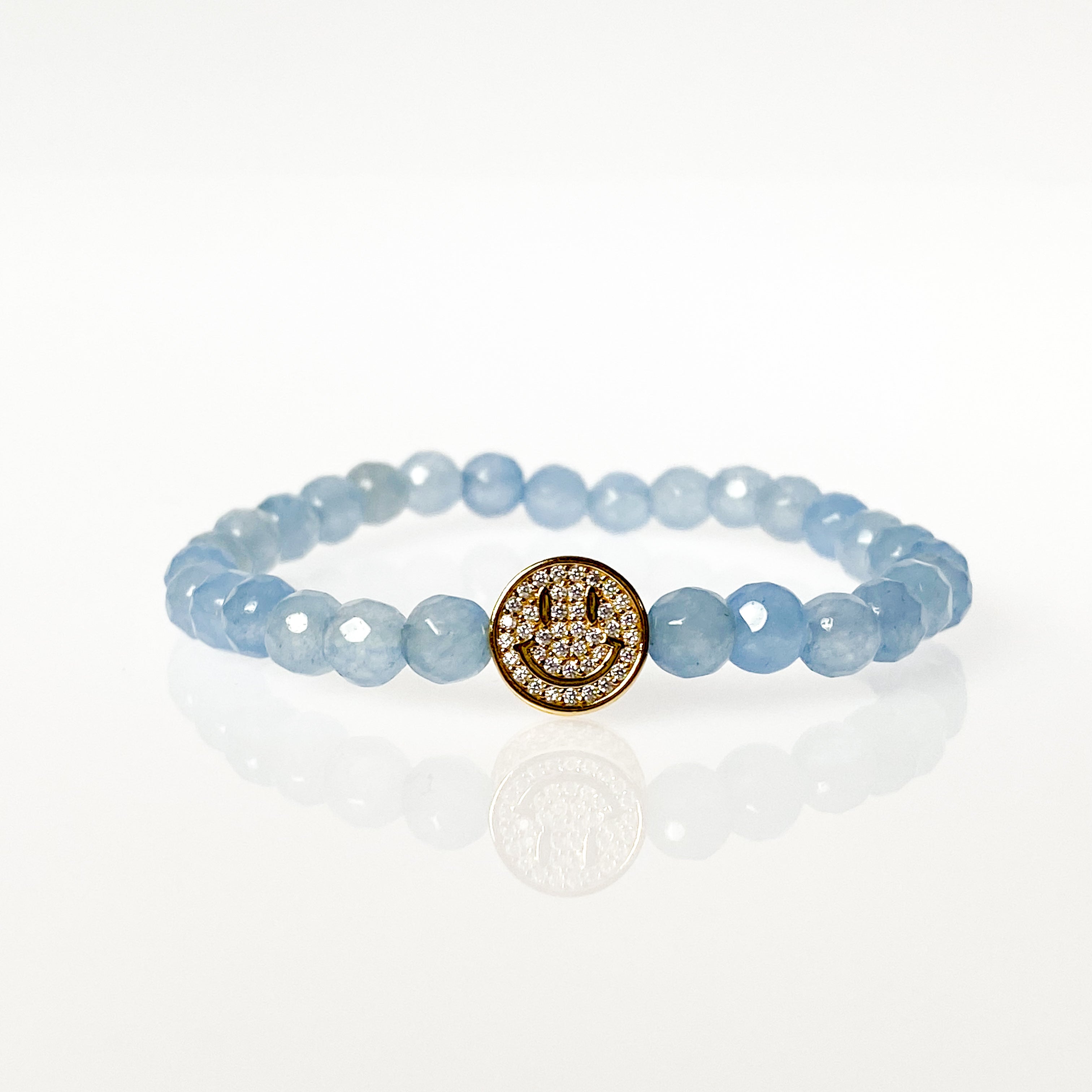 SMILEY FACE ON COOL WATER ELASTIC BRACELET