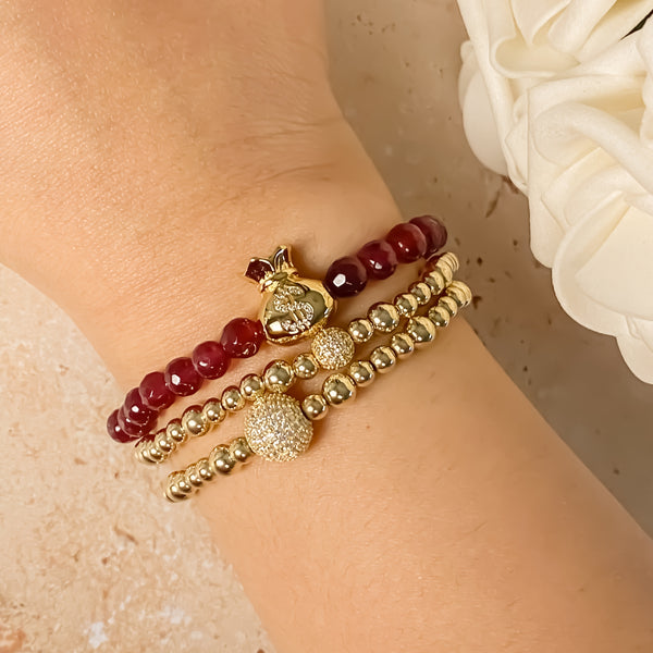 MONEY BAG ON POMEGRANATE ELASTIC BRACELET
