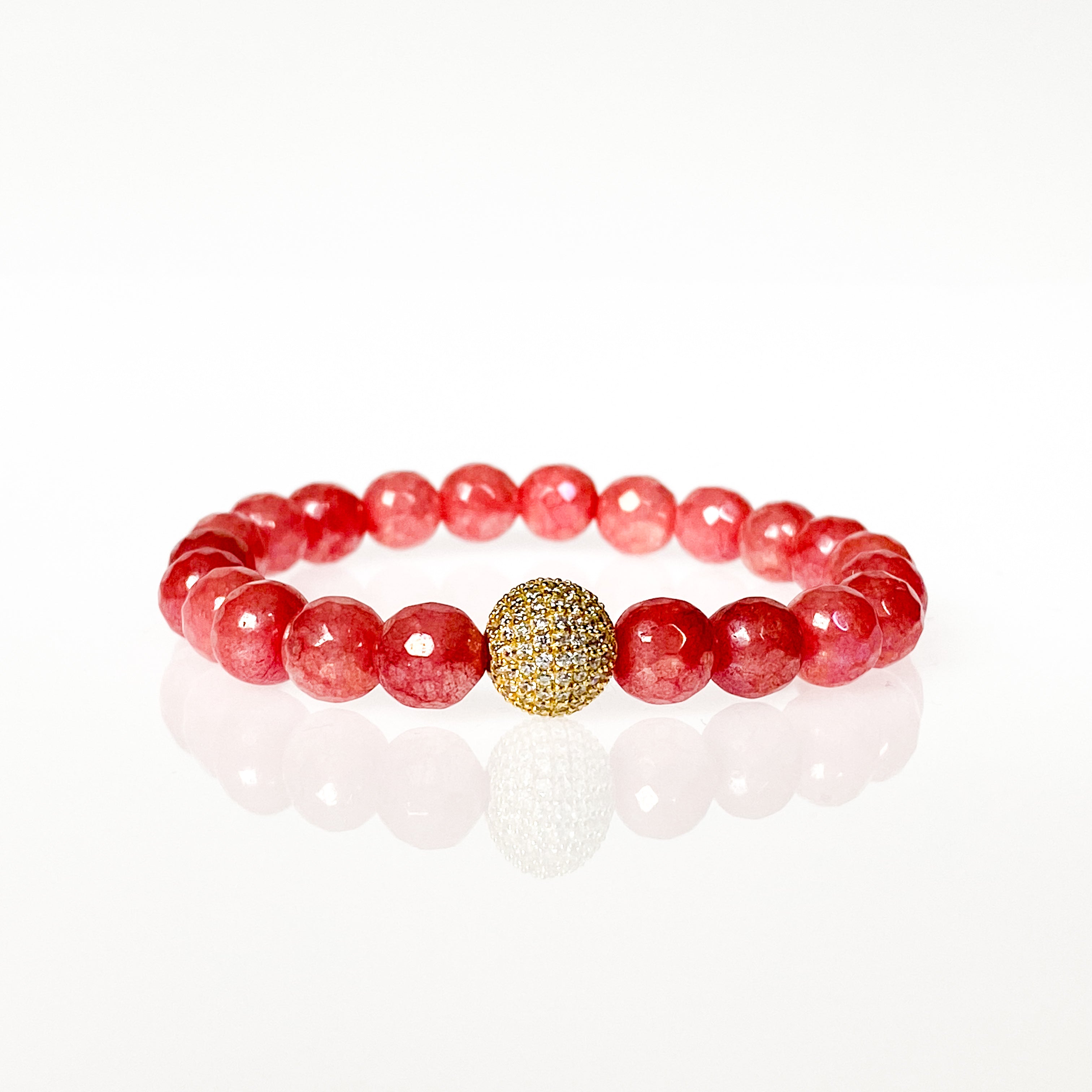 CRYSTAL BALL ON CORAL JADE ELASTIC BRACELET