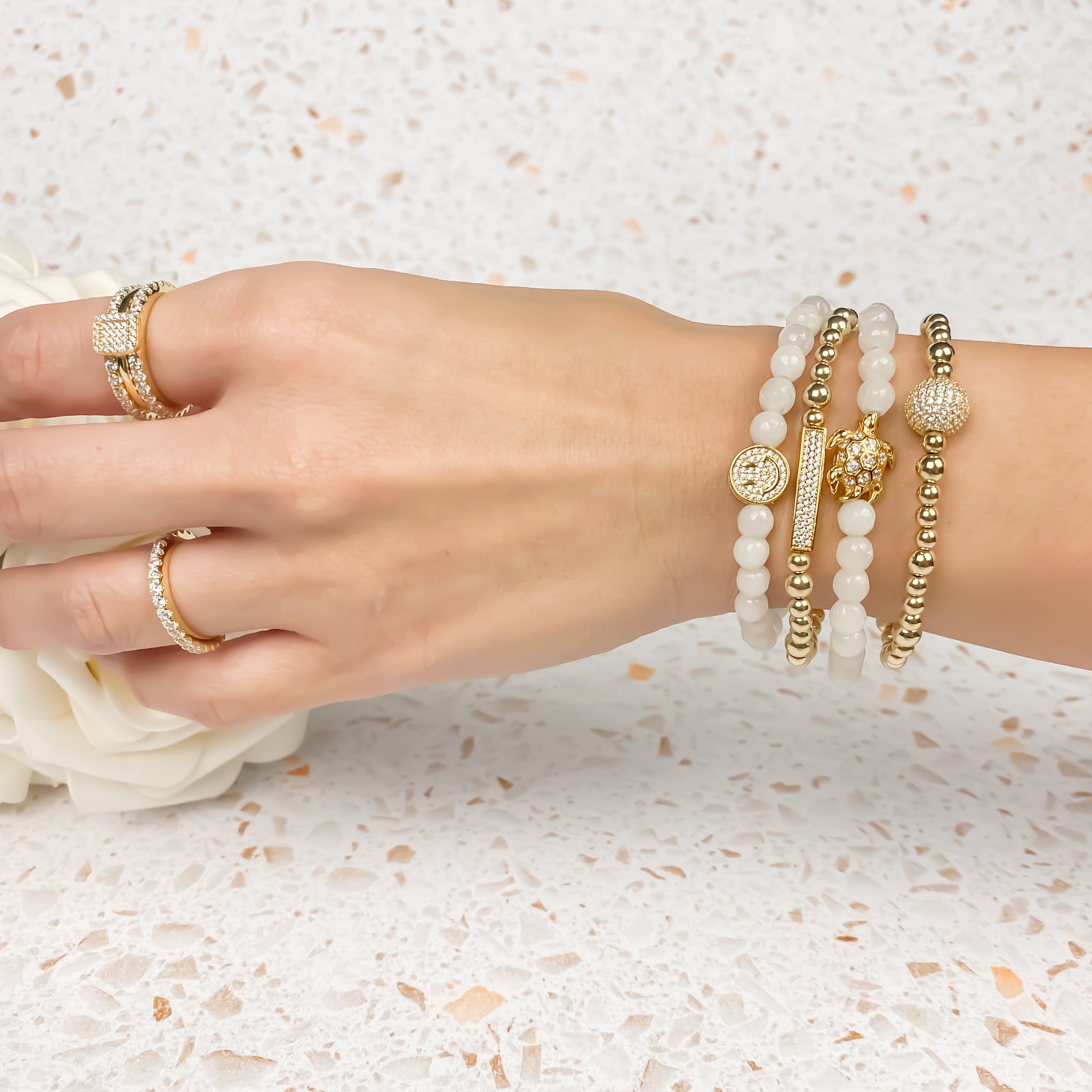 SMILEY FACE ON WHITE JADE ELASTIC BRACELET