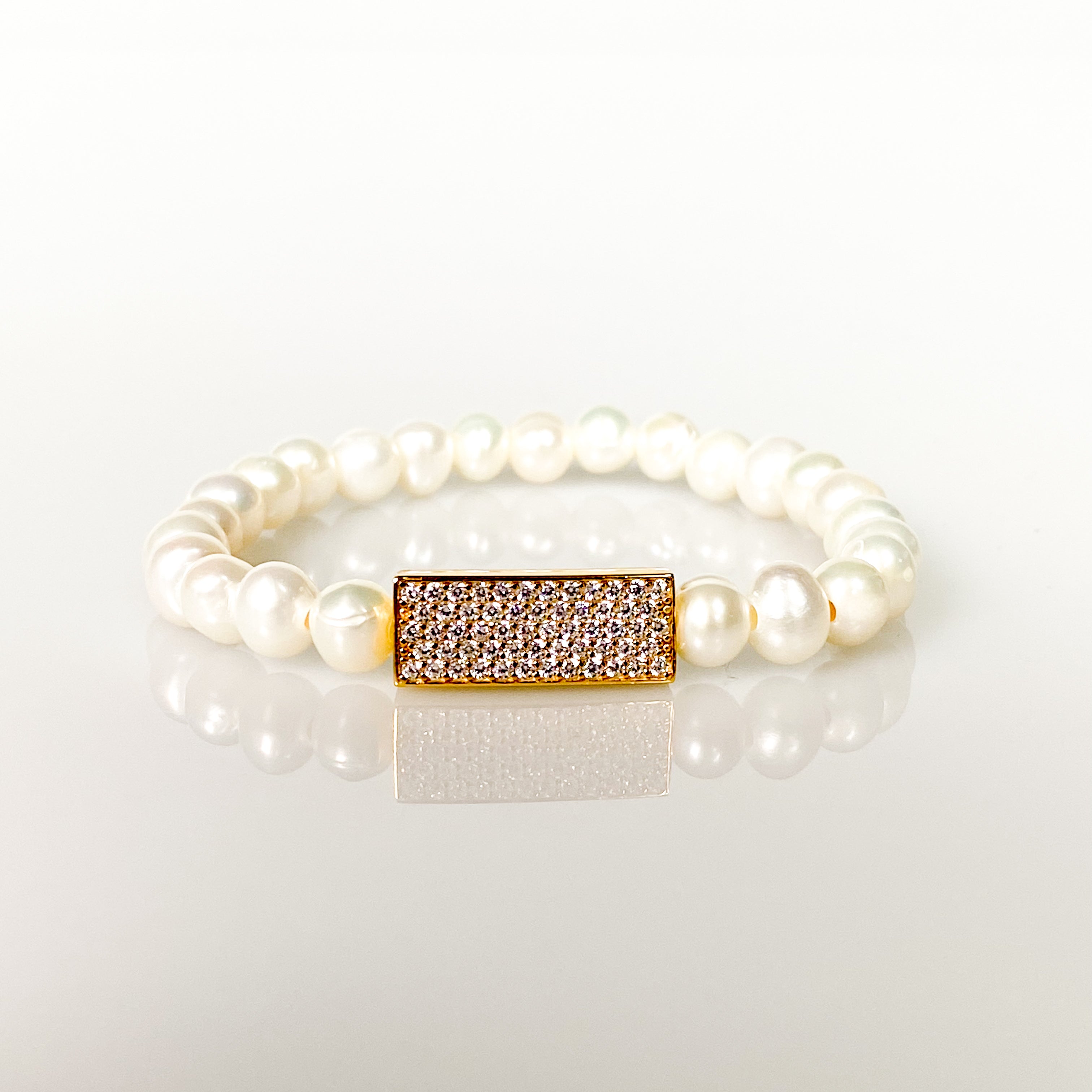 CYRSTAL BAR ON WHITE PEARL ELASTIC BRACELET