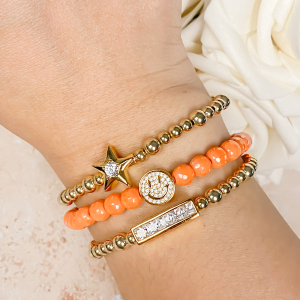SMILEY FACE ON ORANGE SODA JADE ELASTIC BRACELET