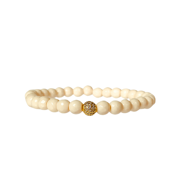 MINI CRYSTAL BALL ON FRENCH VANILLA JADE ELASTIC BRACELET